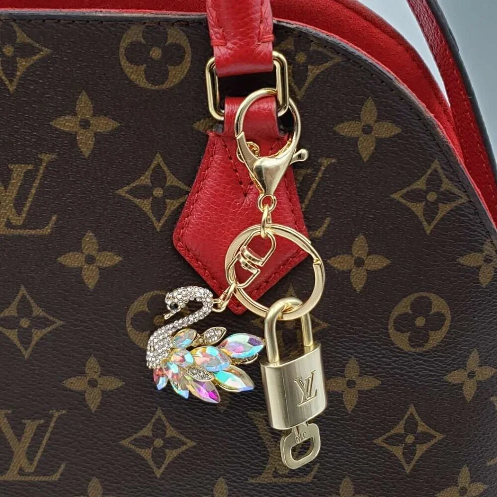 Authentic Louis Vuitton Gold Padlock & Key with Unbranded Swan Keychain - Picture 8 of 8
